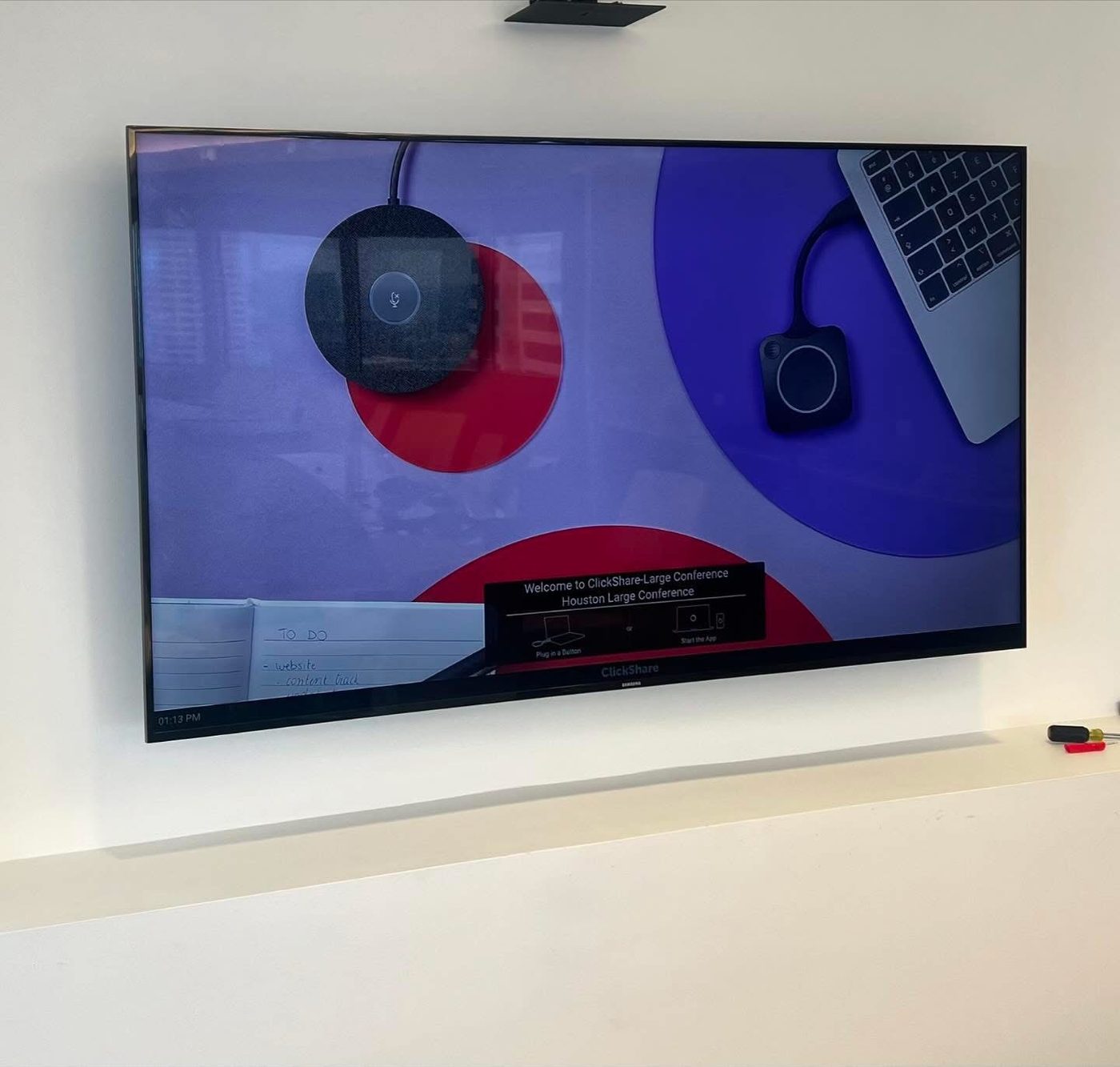 Barco ClickShare wireless presentation system installed in a conference room for a property management client in Houston